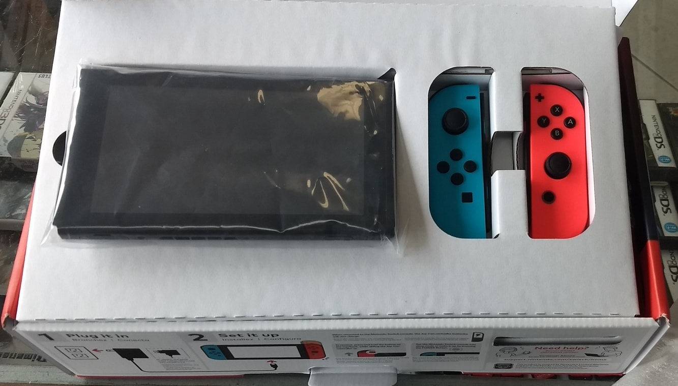 CONSOLE NINTENDO SWITCH NEON BLUE AND RED JOY-CON SYSTEM - jeux video game-x